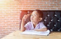 Cute young boy doing homework Royalty Free Stock Photo