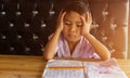 Cute young boy doing homework Royalty Free Stock Photo