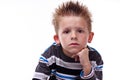 Cute young boy looking bored Royalty Free Stock Photo