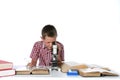 Cute young boy looking through a microscope Royalty Free Stock Photo
