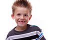 Cute young boy smiling and missing teeth Royalty Free Stock Photo