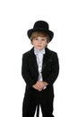 Cute young boy in tuxedo and top hat Royalty Free Stock Photo