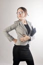 Cute young business lady in gray jacket Royalty Free Stock Photo