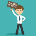 young businessman with I hate monday board