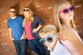 Cute Young Caucasian Brother And Sister Wearing Sunglasses