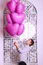 Cute Young Caucasian Girl Holding A Big Pink Balloons. Royalty Free Stock Photo