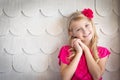 Cute Young Caucasian Girl Portrait Against An Ornate Wall