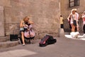 Cute young cellist street musician