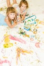 Cute young child girls painting over white Royalty Free Stock Photo