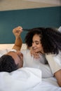 Cute young couple feeling romantic in a hotel room