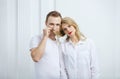 Young couple fooling around indoors