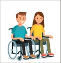 Cute young couple man and woman with disabilities sit in wheelchairs.