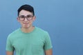 Cute young ethnic male with glasses