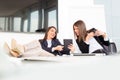 Cute young female workers are resting in office Royalty Free Stock Photo