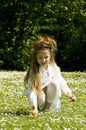 Cute young girl picking flowers Royalty Free Stock Photo