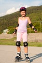 Cute young girl rollerskates