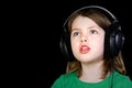 Cute Young Girl Singing with Headphones Royalty Free Stock Photo