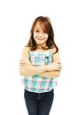 Cute young girl standing with folded hands