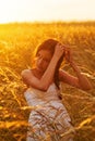 Cute young girl in a summer meadow Royalty Free Stock Photo