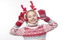 Cute young girl wearing deer horns. New year concept. Royalty Free Stock Photo