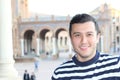 Cute young guy with a nautical style striped sweater