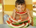 Cute young little boy with watermelon crustes Royalty Free Stock Photo
