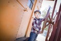 Cute Young Mixed Race Boy Having Fun on Railroad Car Royalty Free Stock Photo