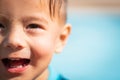 cute young mixed race boy smiling in the sun Royalty Free Stock Photo