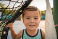 cute young mixed race boy smiling in the sun Royalty Free Stock Photo