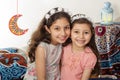 Cute young Muslim girl holding Ramadan lantern