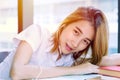 Cute young teen Asian university girl in uniform smiling Royalty Free Stock Photo