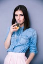 Cute young woman drinking champagne Royalty Free Stock Photo