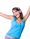 Cute young woman with headphones dancing on music