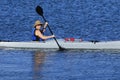 Cute young woman kayaking in California