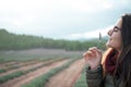 Cute young woman smelling lavender flowers cluster in Caravaca de la Cruz, Murcia, Spain Royalty Free Stock Photo