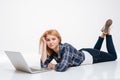 Cute young woman using laptop computer Royalty Free Stock Photo