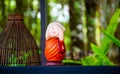Cutes decoration , little monk doll and wooden baske in local cafe at Wat Rai Cheon Ta Wan , Chiangrai , Thailand. Royalty Free Stock Photo
