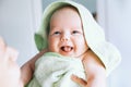 Cutest baby after bath with towel on head.