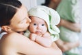 Cutest baby after bath with towel on head.