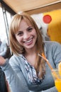 Cutest blond on earth sitting at table in coffee shop