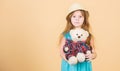Cutest ever. Small girl straw hat hold teddy bear plush toy. In love with cute teddy bear. Happy childhood. Tender Royalty Free Stock Photo