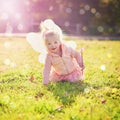 The cutest fairy has landed. Portrait of an adorable little girl dressed up as a fairy and having fun outside.