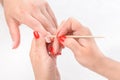 Cuticles care with cuticle pusher Royalty Free Stock Photo