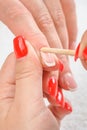 Cuticles care with cuticle pusher Royalty Free Stock Photo