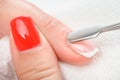 Cuticles care with cuticle pusher Royalty Free Stock Photo