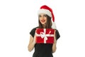 Cutie girl in santa hat with red gift Royalty Free Stock Photo