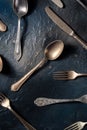 Cutlery flat lay. Spoons, forks, and knives, various table utensils, top shot