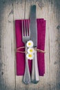 Cutlery - fork and knife on purple napkin in vintage stile Royalty Free Stock Photo