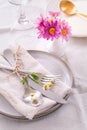 Cutlery with napkin and flower decoration - fine dining and place setting