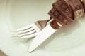 Cutlery on a plate Royalty Free Stock Photo